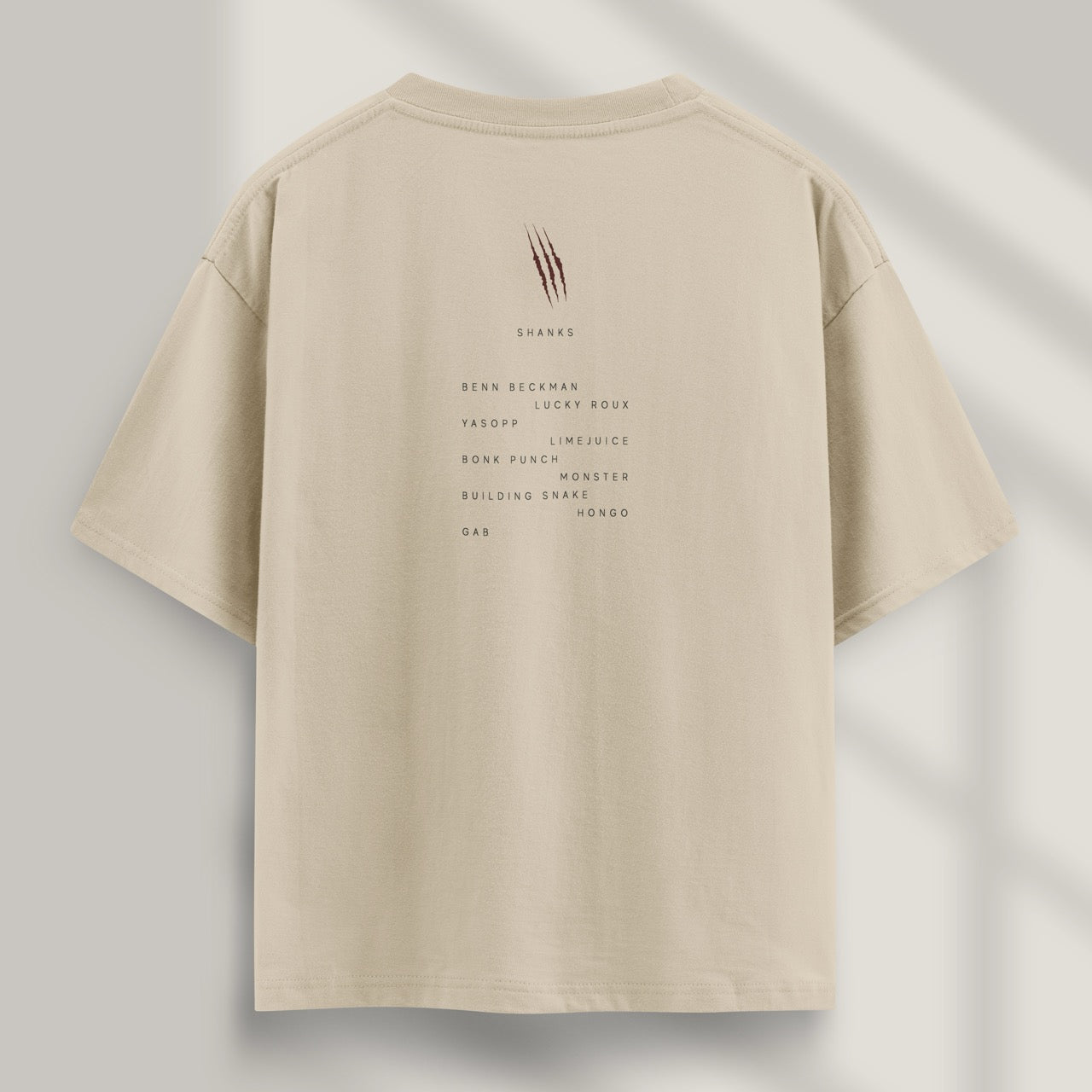 camiseta shanks one piece beige detras