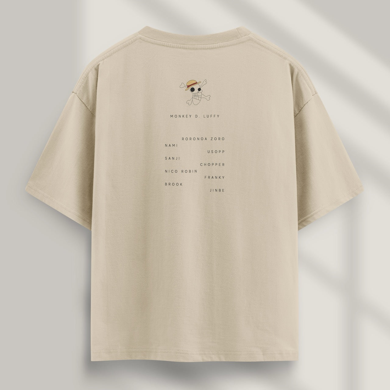 camiseta one piece mugiwara beige detras