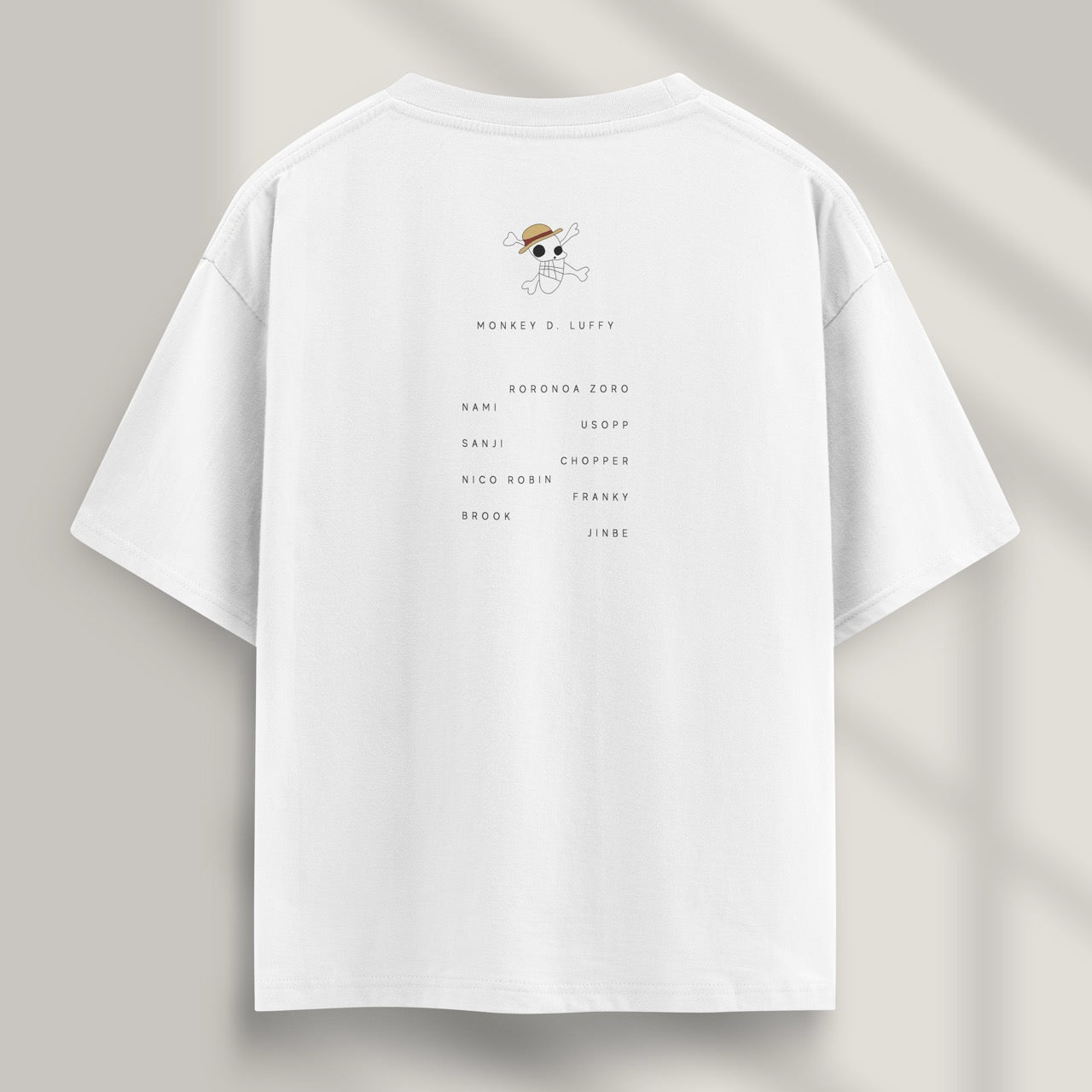 camiseta one piece mugiwara blanca detras